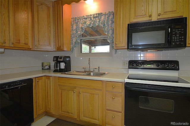 11823 Williams Way, Northglenn, CO 80233 - kitchen with black appliances, a sink, backsplash, and light countertops