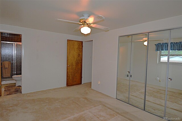 11823 Williams Way, Northglenn, CO 80233 - unfurnished bedroom with carpet floors, ensuite bath, and a ceiling fan