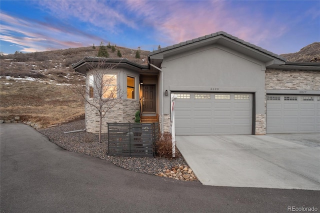 view of front of home featuring a garage