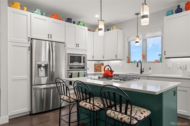 kitchen featuring white cabinets, sink, and stainless steel appliances