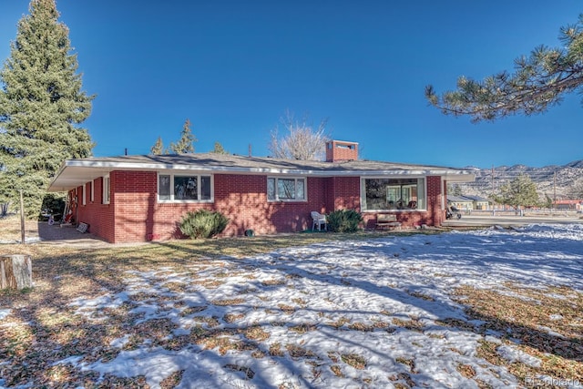 view of front of house with a mountain view