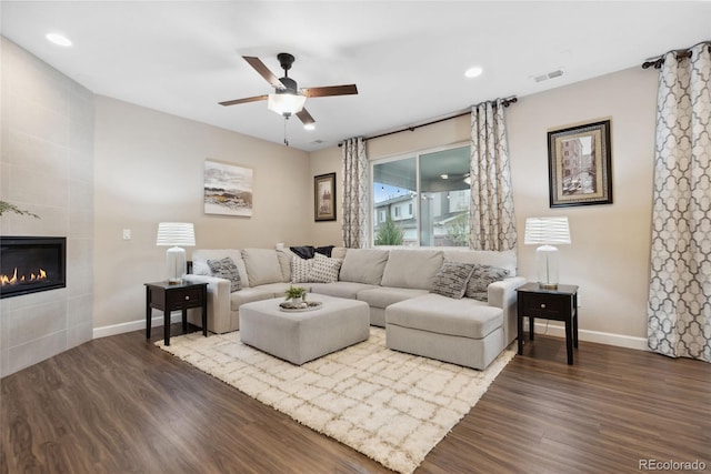 16400 Alberta Dr, Parker, CO 80134 - living area with dark wood-style floors, ceiling fan, baseboards, a fireplace, and recessed lighting