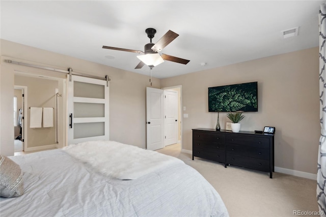 16400 Alberta Dr, Parker, CO 80134 - bedroom featuring a barn door, baseboards, light colored carpet, and ceiling fan