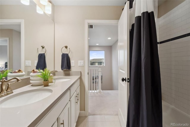 16400 Alberta Dr, Parker, CO 80134 - bathroom with tile patterned floors, double vanity, and shower / tub combo