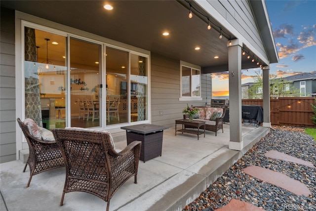 16400 Alberta Dr, Parker, CO 80134 - view of patio with outdoor lounge area and fence