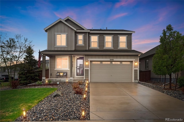 16400 Alberta Dr, Parker, CO 80134 - view of front of property featuring an attached garage, board and batten siding, concrete driveway, covered porch, and a yard