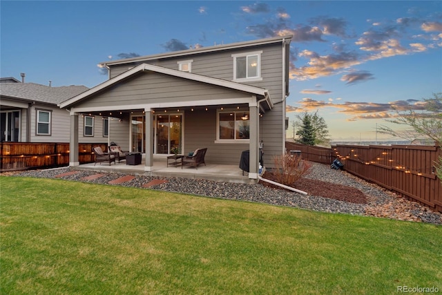 16400 Alberta Dr, Parker, CO 80134 - back of property with outdoor lounge area and a patio