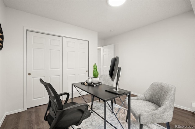 670 Winona Ct Unit 38, Denver, CO 80204 - office area with baseboards and dark wood-style flooring