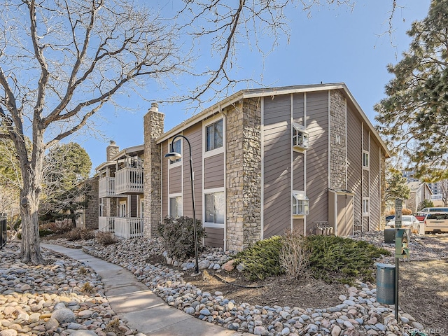 view of home's exterior featuring a balcony