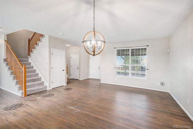 11748 Mill Valley St, Parker, CO 80138 - unfurnished living room with stairs, a chandelier, wood finished floors, and baseboards