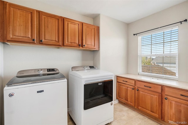 11748 Mill Valley St, Parker, CO 80138 - laundry area featuring cabinet space and washing machine and clothes dryer