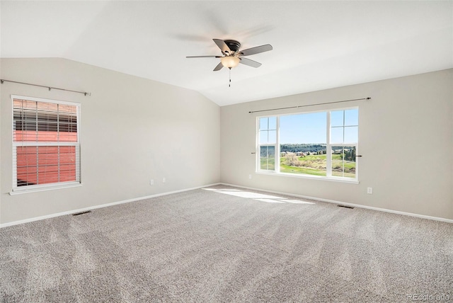 11748 Mill Valley St, Parker, CO 80138 - carpeted spare room with lofted ceiling, ceiling fan, and baseboards