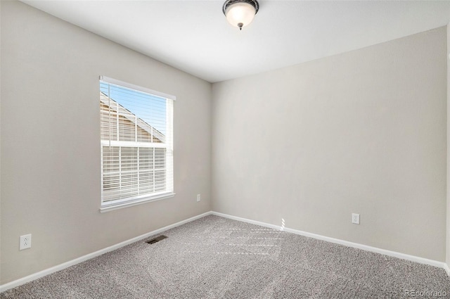 11748 Mill Valley St, Parker, CO 80138 - spare room featuring carpet flooring and baseboards