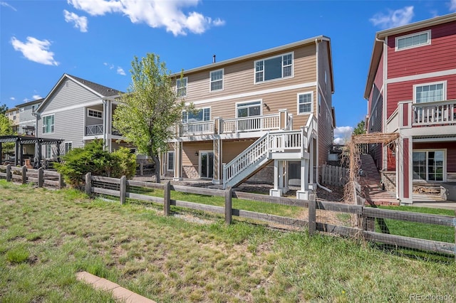 11748 Mill Valley St, Parker, CO 80138 - rear view of house with stairway and a deck