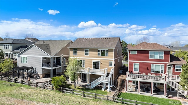 11748 Mill Valley St, Parker, CO 80138 - rear view of property with stairs, a fenced backyard, a patio area, and a residential view