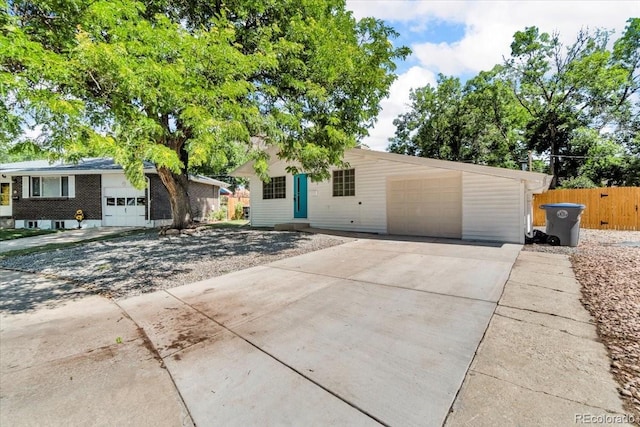 10 Juneau Pl, Longmont, CO 80504 - ranch-style home with driveway and an attached garage