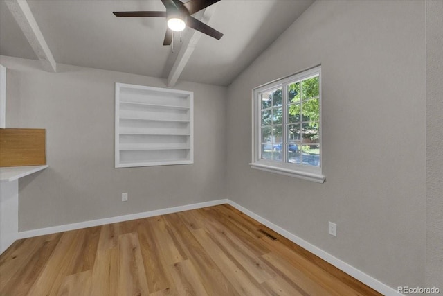 10 Juneau Pl, Longmont, CO 80504 - unfurnished room featuring wood finished floors, ceiling fan, and built in shelves