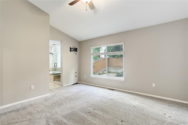 354 Willowick Cir, Highlands Ranch, CO 80129 - spare room featuring lofted ceiling, carpet, ceiling fan, and baseboards