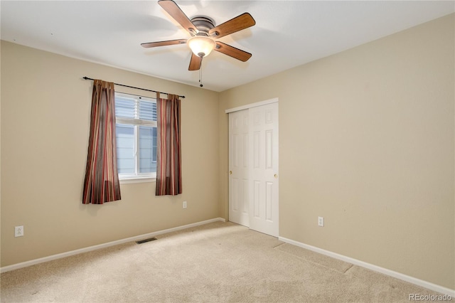 354 Willowick Cir, Highlands Ranch, CO 80129 - empty room with light carpet, a ceiling fan, and baseboards