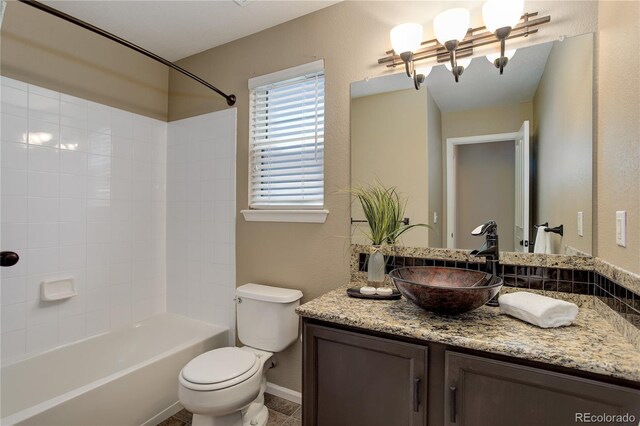 354 Willowick Cir, Highlands Ranch, CO 80129 - full bath with vanity, toilet, shower / tub combination, and a chandelier