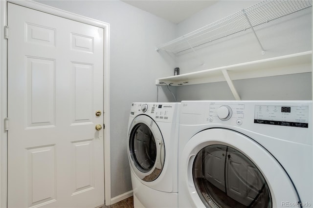 354 Willowick Cir, Highlands Ranch, CO 80129 - laundry room featuring washer and clothes dryer and baseboards