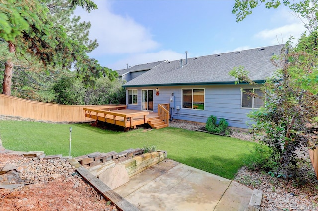 354 Willowick Cir, Highlands Ranch, CO 80129 - back of property featuring roof with shingles, a deck, and a patio area