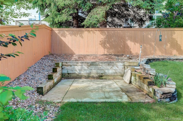 354 Willowick Cir, Highlands Ranch, CO 80129 - fenced backyard featuring a patio area