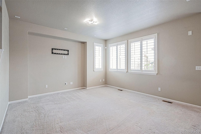 17187 E Cedar Gulch Dr, Parker, CO 80134 - carpeted empty room featuring a textured ceiling and baseboards