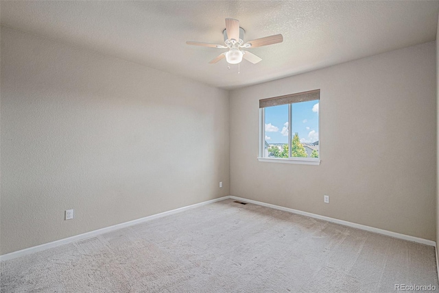 17187 E Cedar Gulch Dr, Parker, CO 80134 - empty room featuring ceiling fan, light carpet, and a textured ceiling