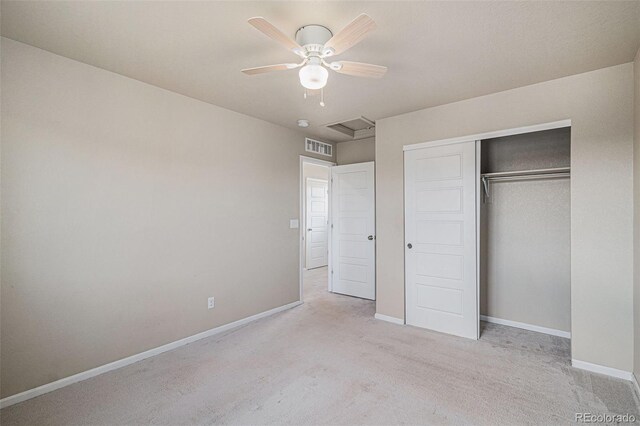 17187 E Cedar Gulch Dr, Parker, CO 80134 - unfurnished bedroom with carpet flooring, a closet, ceiling fan, and attic access