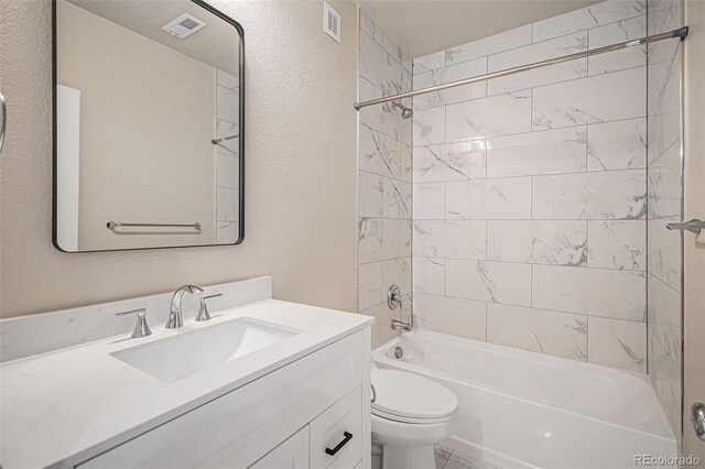 17187 E Cedar Gulch Dr, Parker, CO 80134 - full bath featuring a textured wall, vanity, and shower / bathtub combination