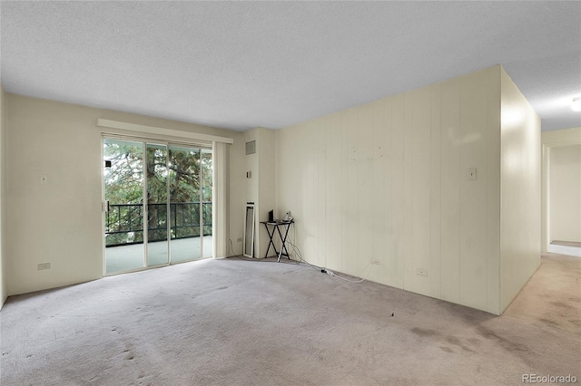 2325 S Linden Ct Unit 206, Denver, CO 80222 - unfurnished room featuring carpet flooring and a textured ceiling