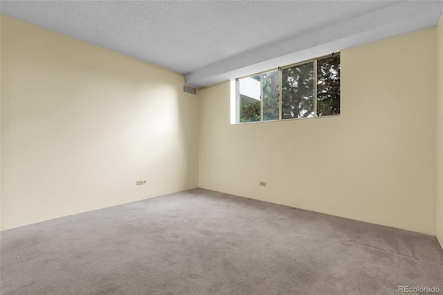 2325 S Linden Ct Unit 206, Denver, CO 80222 - empty room with carpet floors and a textured ceiling