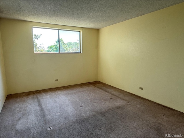 2325 S Linden Ct Unit 206, Denver, CO 80222 - empty room with carpet floors and a textured ceiling