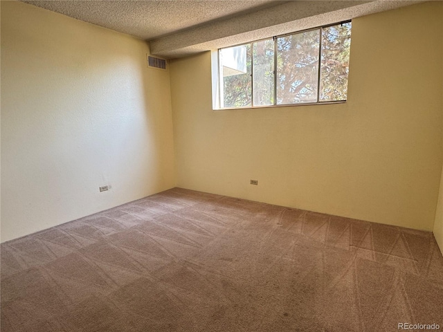 2325 S Linden Ct Unit 206, Denver, CO 80222 - unfurnished room with carpet flooring and a textured ceiling