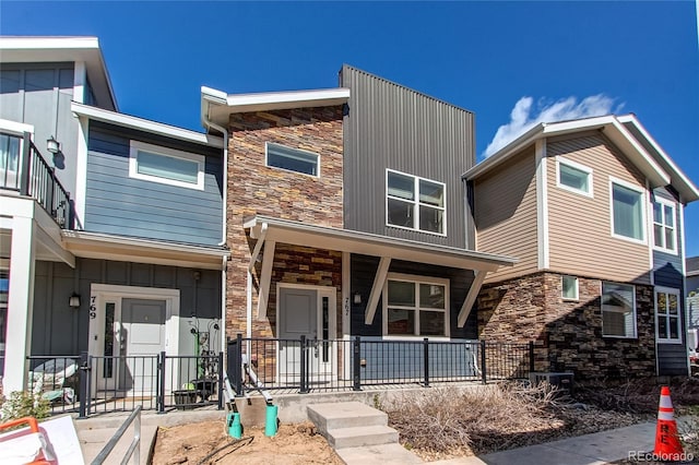 767 Robert St, Longmont, CO 80503 - multi unit property with stone siding, covered porch, and board and batten siding