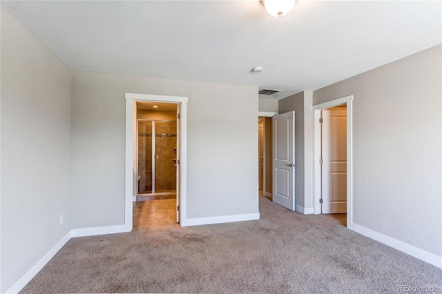 767 Robert St, Longmont, CO 80503 - unfurnished bedroom featuring carpet flooring and baseboards