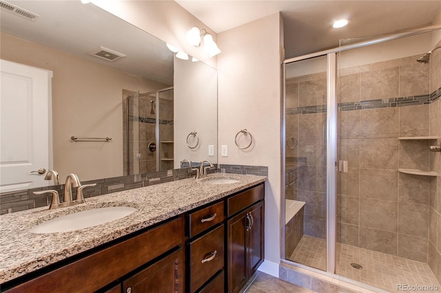 767 Robert St, Longmont, CO 80503 - bathroom with double vanity and a shower stall