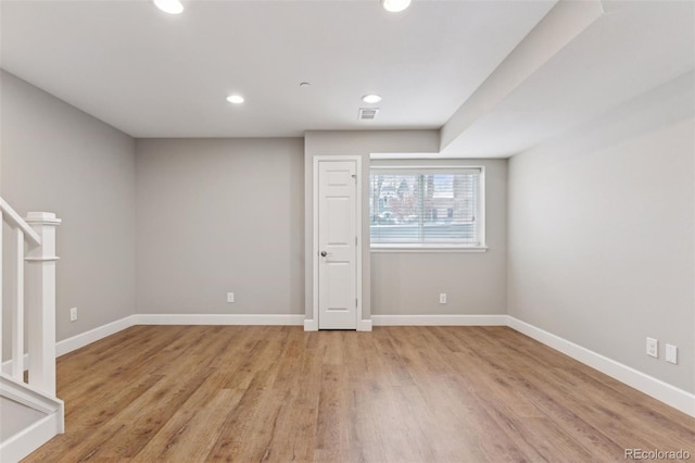 basement featuring light wood-type flooring