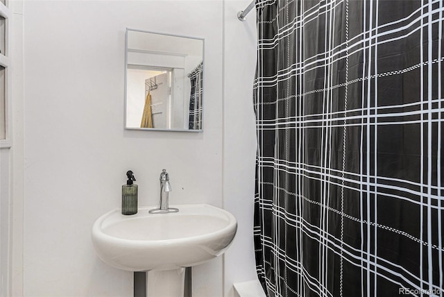4536 Beach Ct, Denver, CO 80211 - full bathroom with a shower with curtain and a sink