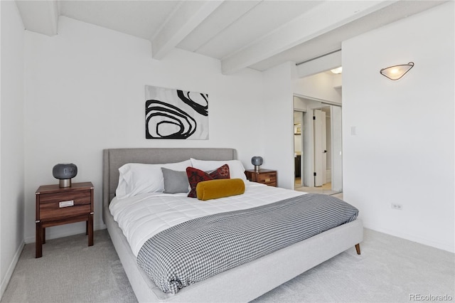 bedroom featuring light colored carpet, beam ceiling, and baseboards