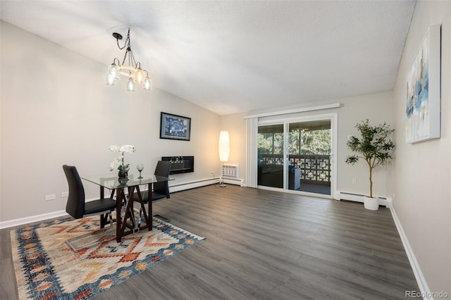 dining area with vaulted ceiling, dark hardwood / wood-style floors, a baseboard radiator, a notable chandelier, and a textured ceiling