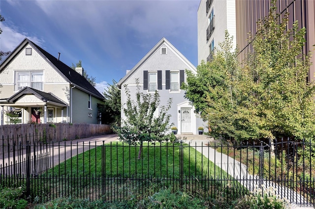 view of front of property with a front lawn