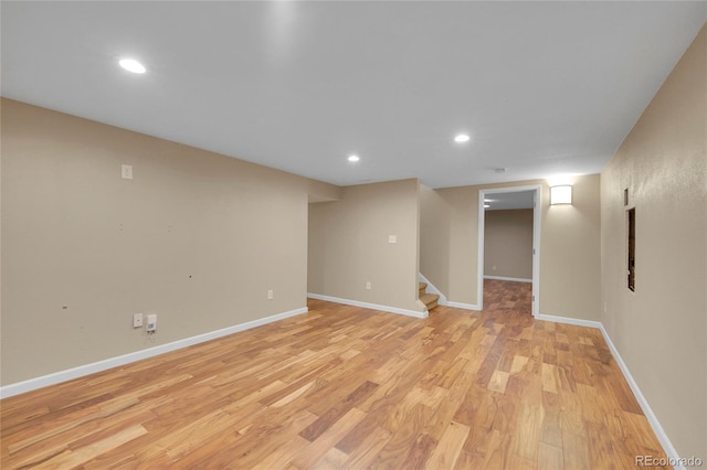 basement featuring light wood-type flooring