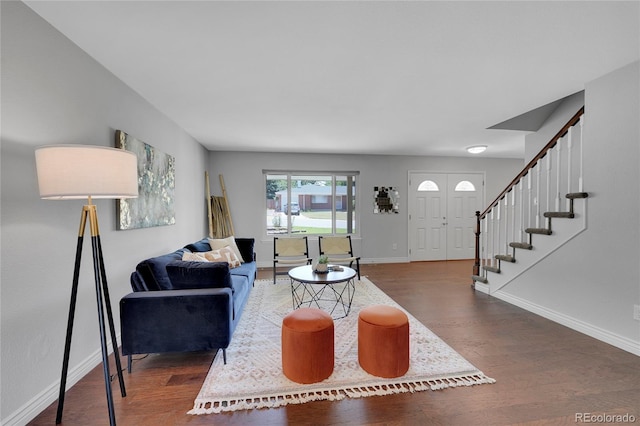 living room with dark hardwood / wood-style floors