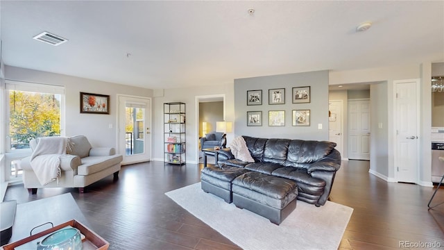 living room featuring dark hardwood / wood-style floors