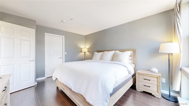 bedroom featuring dark hardwood / wood-style floors