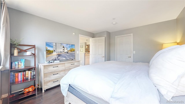 bedroom featuring dark wood-type flooring