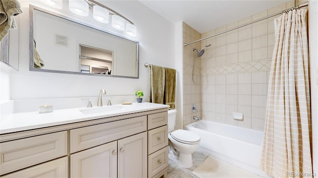 full bathroom featuring vanity, shower / tub combo with curtain, and toilet