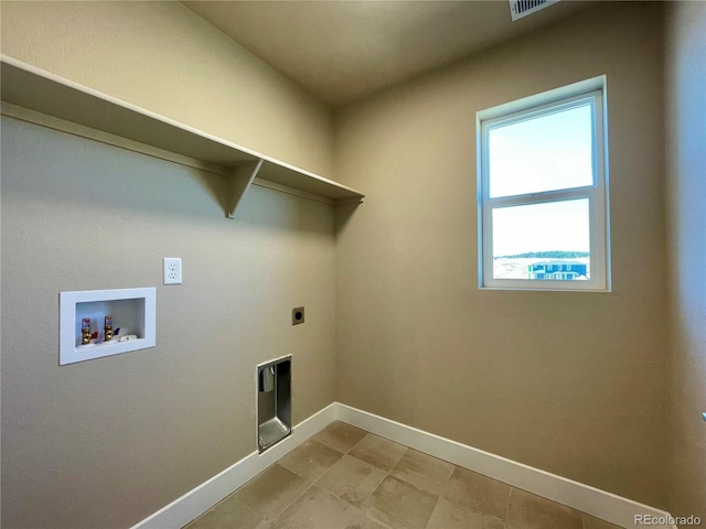 laundry area with hookup for a washing machine and electric dryer hookup